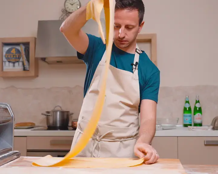 Chef Danilo Cortellini making fresh pasta.