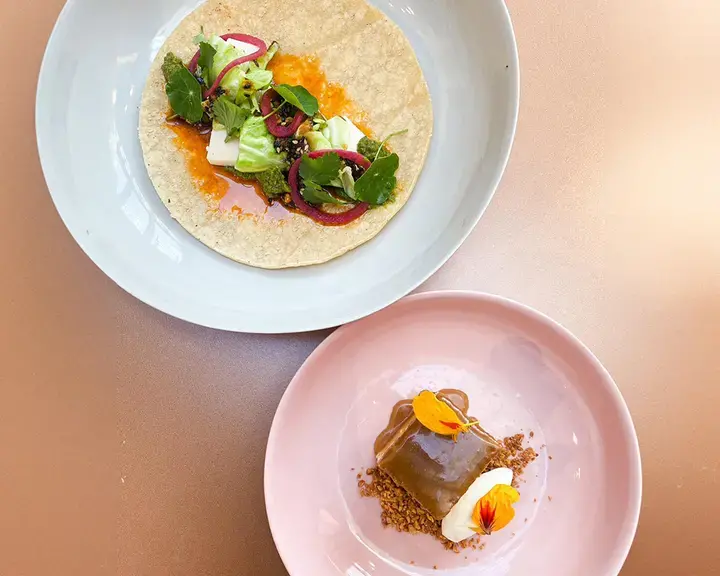Corn tortilla with spiced and roasted cauliflower stems by OzHarvest Sydney.