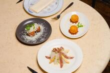 Dishes at Sabor, including croquetas. 