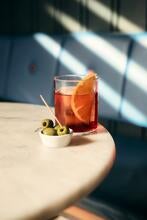 Negroni and olives ay Hey Palu in Edinburgh.